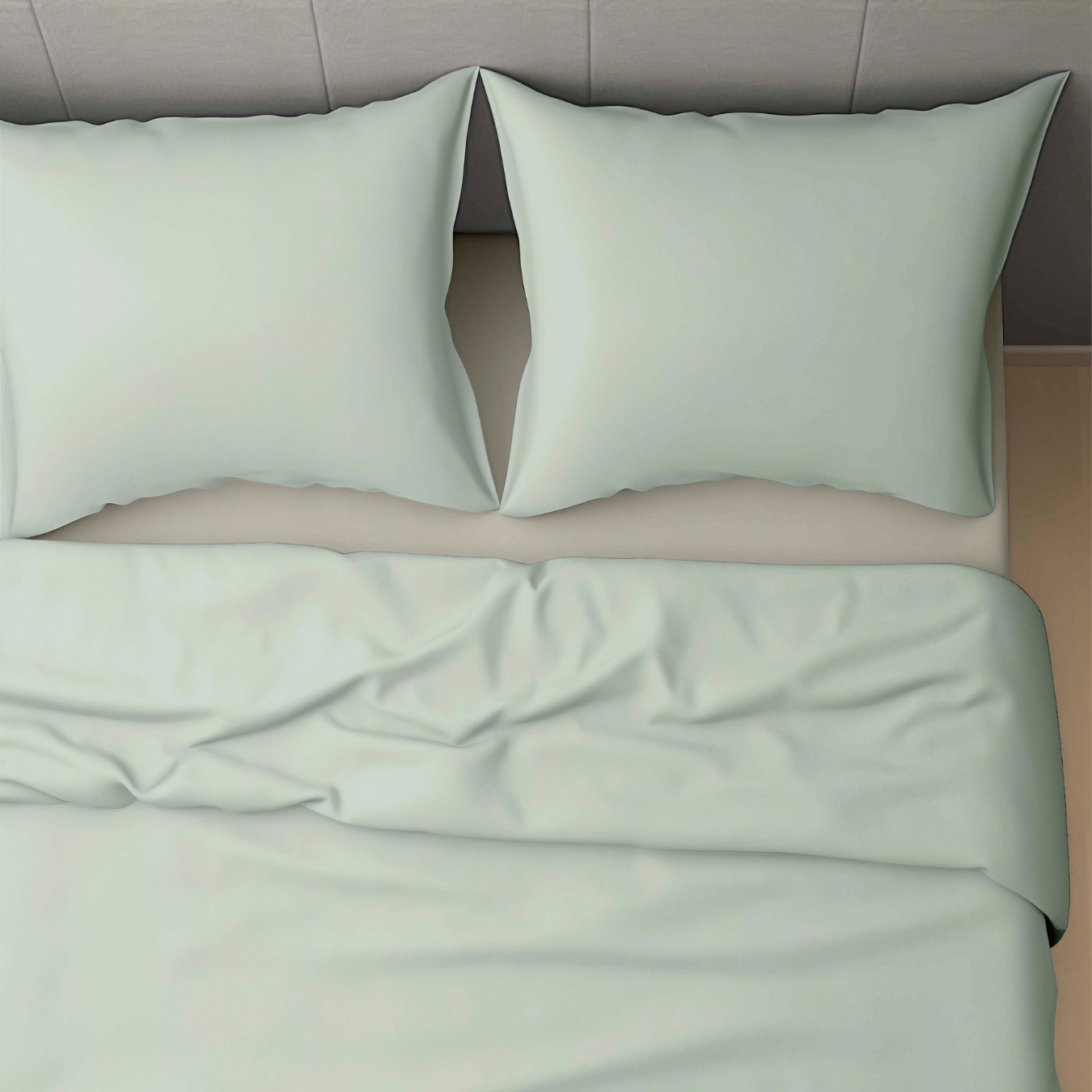 Un lit bien fait avec deux oreillers et un Zelesta Wonderbed 4 Saisons Double Coton - Vert Naturel, vu d'en haut.